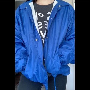 Blue windbreaker/rain jacket
